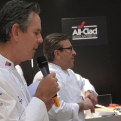 Chef Thomas Keller and Daniel Boulud at the All-Clad booth, rapping. 