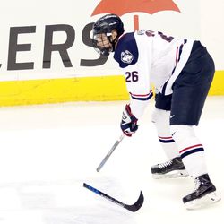 UConn's Philip Nyberg (26) breaks his stick on a shot during the Northeastern Huskies vs UConn Huskies men's college ice hockey game game at the XL Center in Hartford, CT  on November 28, 2017.