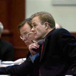 Attorneys Jeff Shields and Mark Callister confer during the second of two arguments involving a land dispute between the Fundamentalist LDS Church and the State of Utah Wednesday.