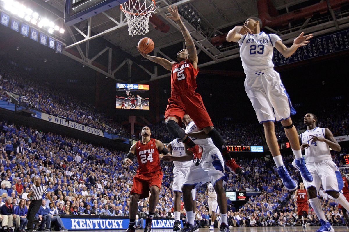 LEXINGTON, KY - DECEMBER 31:  Chris Smith #5 of the Louisville Cardinals shoots the ball during 69-62 loss to the Kentucky Wildcats at Rupp Arena on December 31, 2011 in Lexington, Kentucky.  (Photo by Andy Lyons/Getty Images)