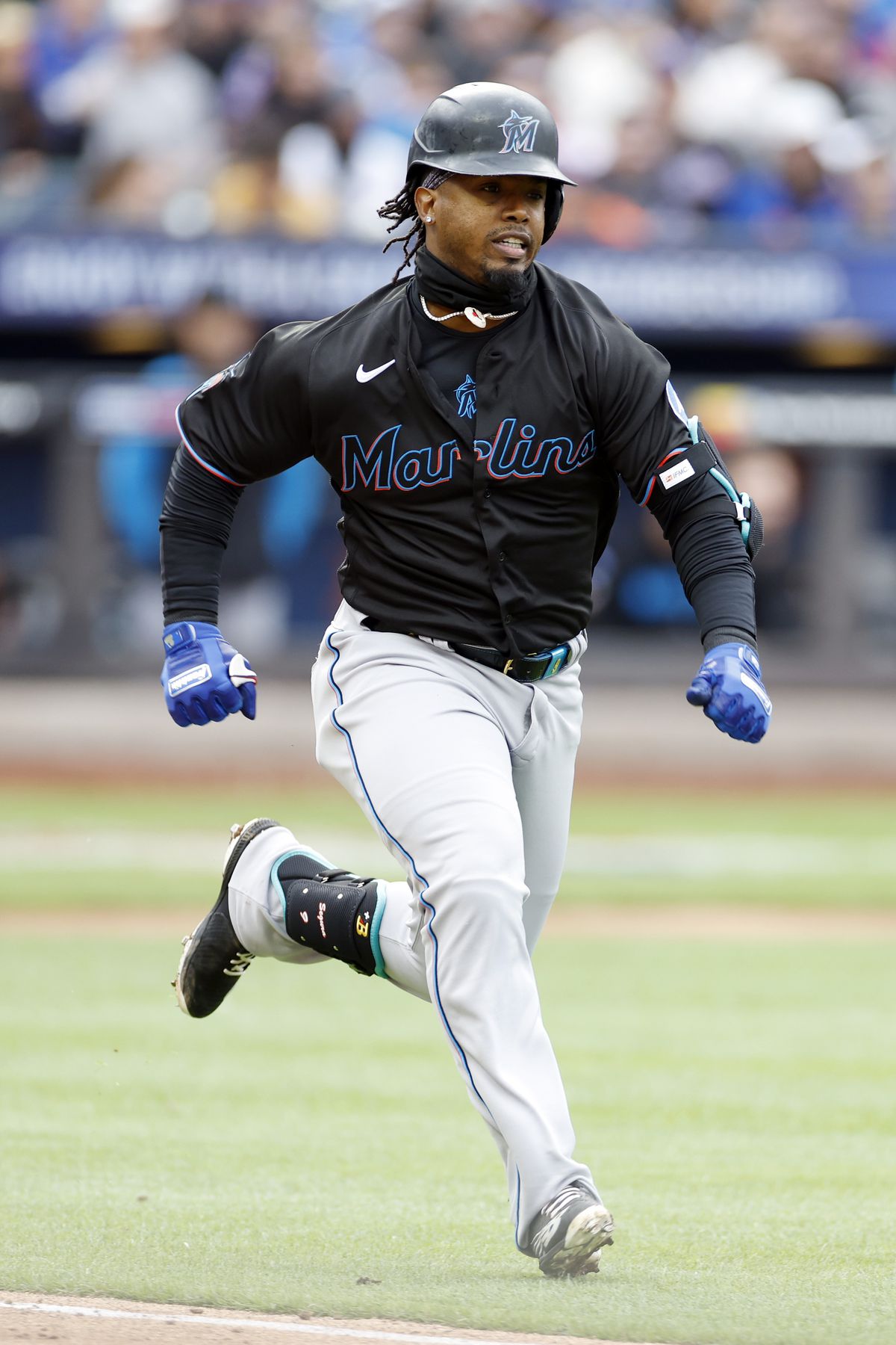 Jean Segura #9 of the Miami Marlins runs to first during the fourth inning against the New York Mets at Citi Field on April 08, 2023 in the Flushing neighborhood of the Queens borough of New York City.