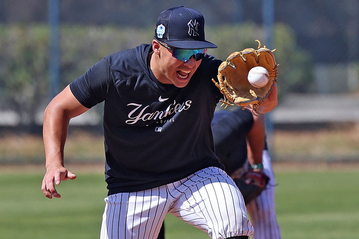 New York Yankees Anthony Volpe practices playing the infield at Steinbrenner Field in Tampa