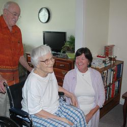 In this May 19, 2010 photo provided by Penny Weaver, author Nelle Harper Lee speaks with friends Wayne Greenhaw, left, and actress Mary Badham, during a visit in Lee's assisted living room in Monroeville, Ala.
