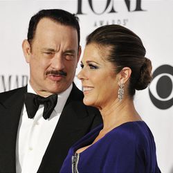 Best performance by an actor in a leading role in a play nominee Tom Hanks, left, and actress Rita Wilson arrive on the red carpet at the 67th Annual Tony Awards, on Sunday, June 9, 2013 in New York.  (Photo by Charles Sykes/Invision/AP)