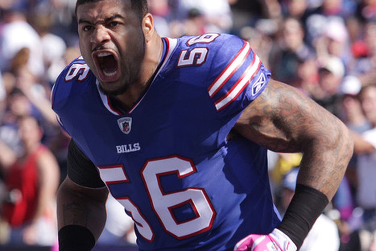 ORCHARD PARK, NY - OCTOBER 09:  Shawne Merriman of the Buffalo Bills celebrates as he enters the stadium during pregame introductions at Ralph Wilson Stadium on October 9, 2011 in Orchard Park, New York.  (Photo by Brody Wheeler/Getty Images)