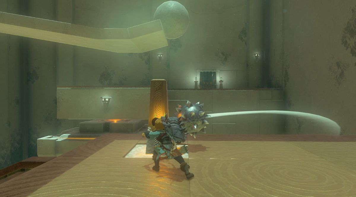 Link hits a button with a big spiky ball to let a boulder smash a button in Mayak Shrine in Zelda: Tears of the Kingdom