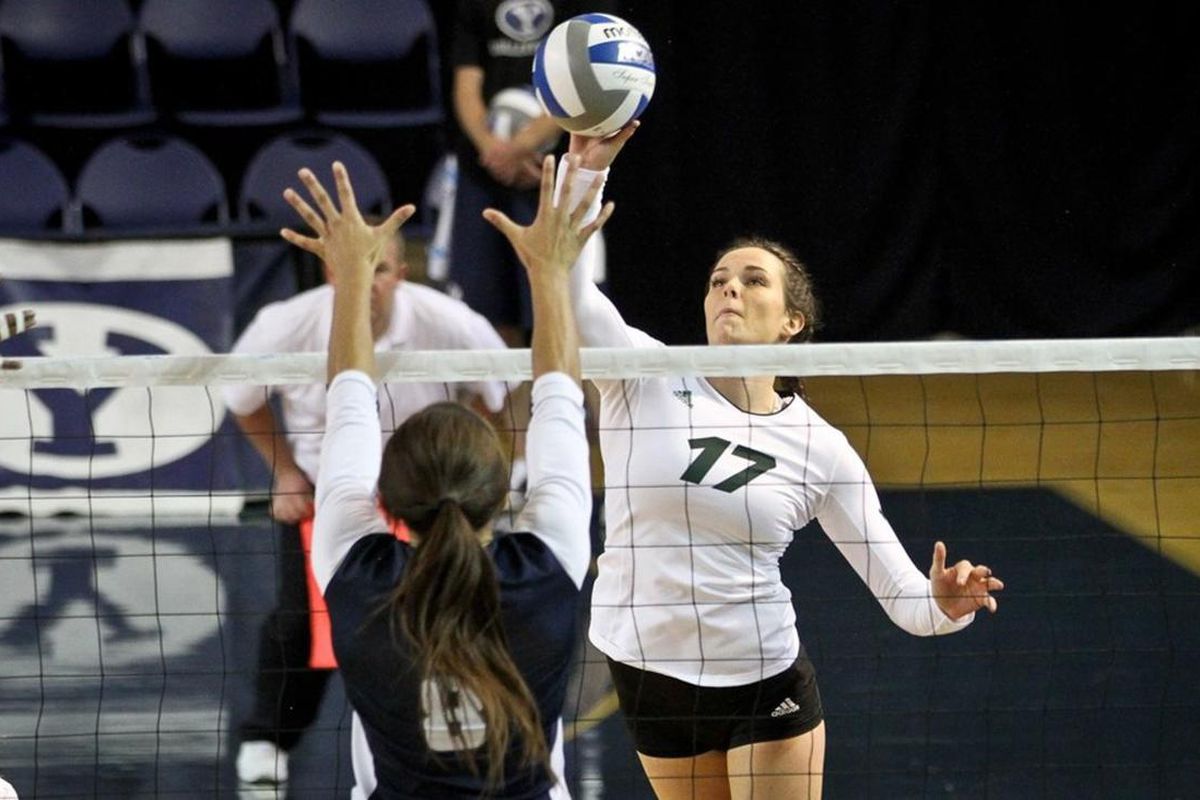 Utah Valley senior outside hitter Lexi Thompson (right-center) looks to attack a ball against Rice at the BYU Invitational at the Smith Fieldhouse on August 27, 2016. On Tuesday, Thompson led UVU to a 3-0 sweep over Southern Utah with a match-high 11 kill
