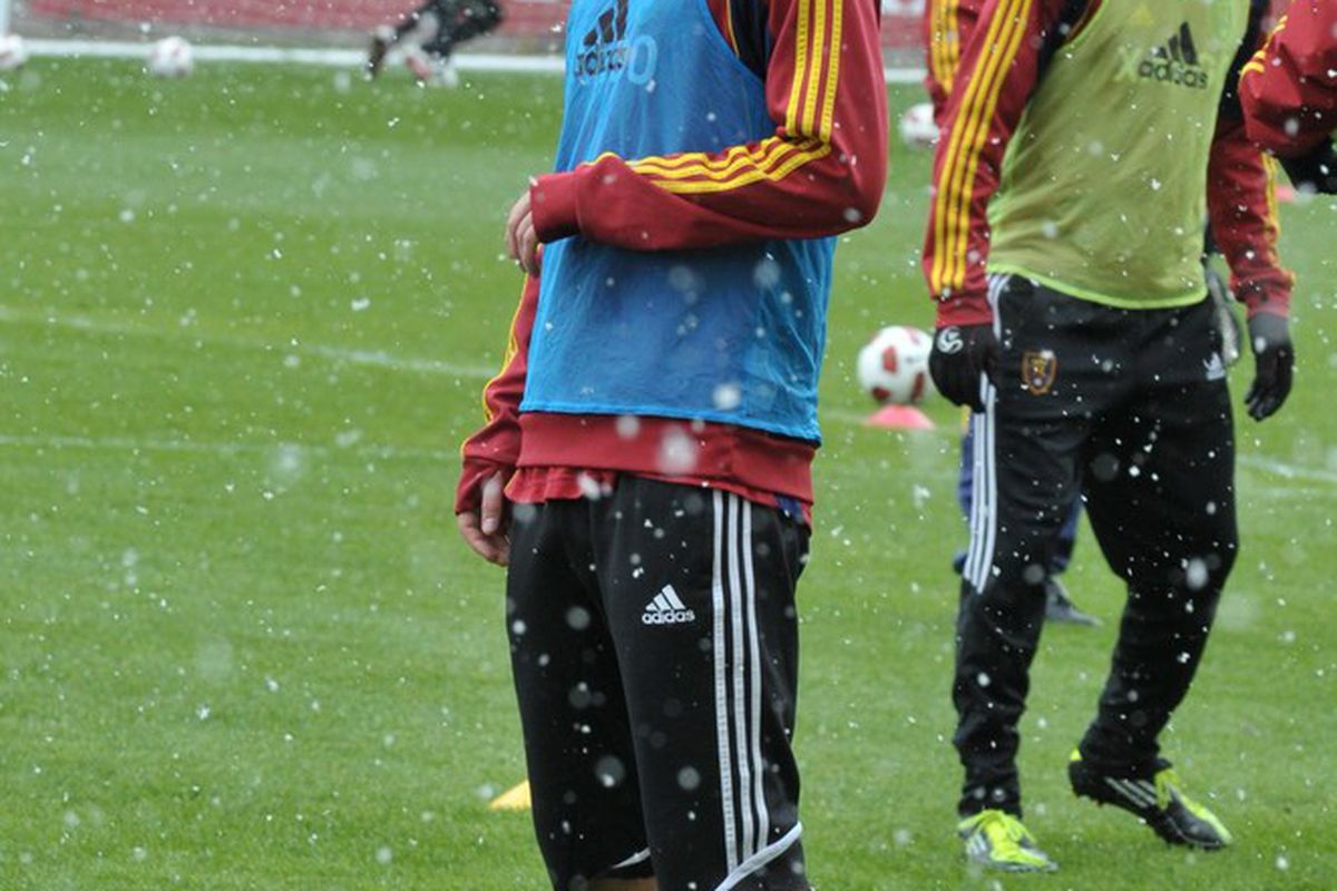 Kyle Beckerman waits for the next drill, while the snow falls at RSL practice.