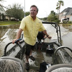 Mark Meyers, of Mormon Helping Hands, ferries other LDS cleanup volunteers in Klein, Texas, on Wednesday, Aug. 30, 2017, following Tropical Storm Harvey.