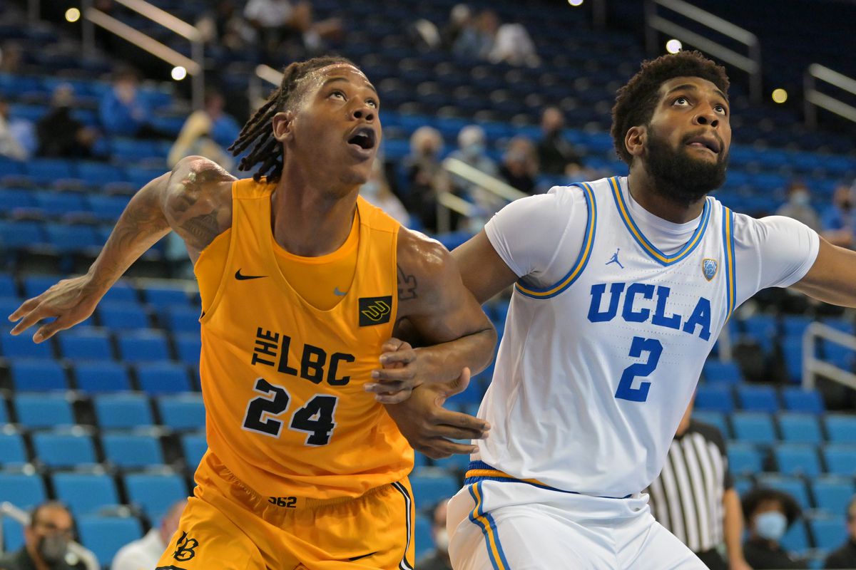 Long Beach State 49ers forward Joe Hampton (24) and UCLA Bruins forward Cody Riley (2) look for a rebound in the second half of the game at Pauley Pavilion presented by Wescom.