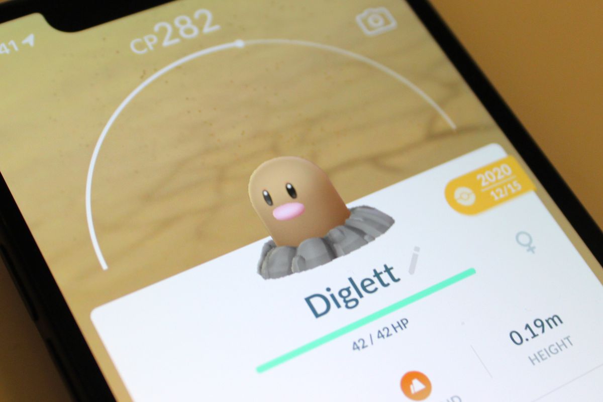 A photo of Diglett in Pokémon Go on an iPhone