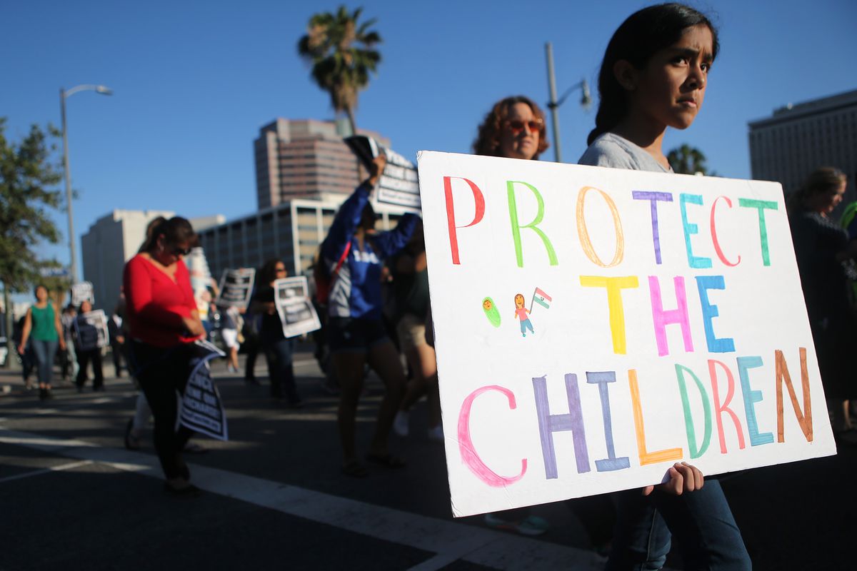 Protestors march against the separation of migrant children from their families on June 18, 2018 in Los Angeles, California.