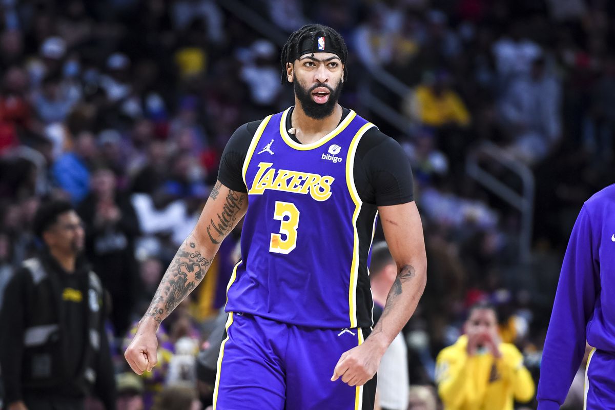Anthony Davis #3 of the Los Angeles Lakers reacts against the Detroit Pistons during the fourth quarter of the game at Little Caesars Arena on November 21, 2021 in Detroit, Michigan.