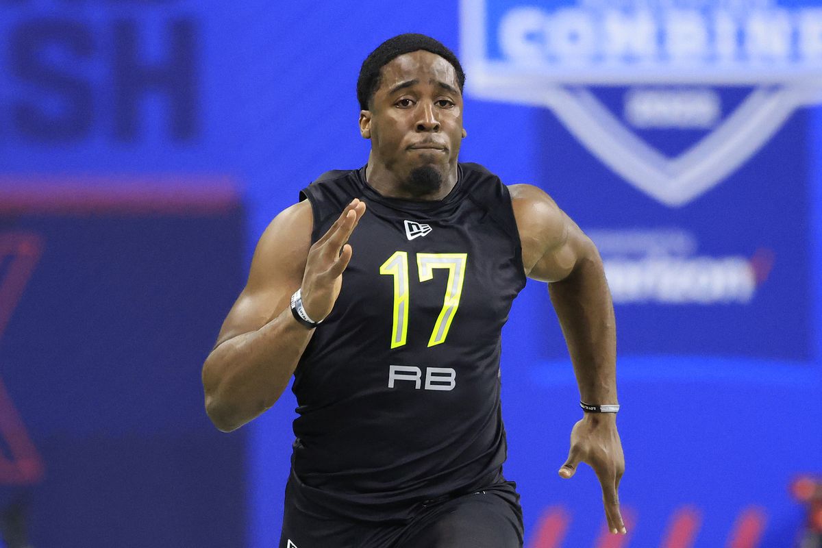 Breece Hall #RB17 of the Iowa State Cyclones runs the 40 yard dash during the NFL Combine at Lucas Oil Stadium on March 04, 2022 in Indianapolis, Indiana.