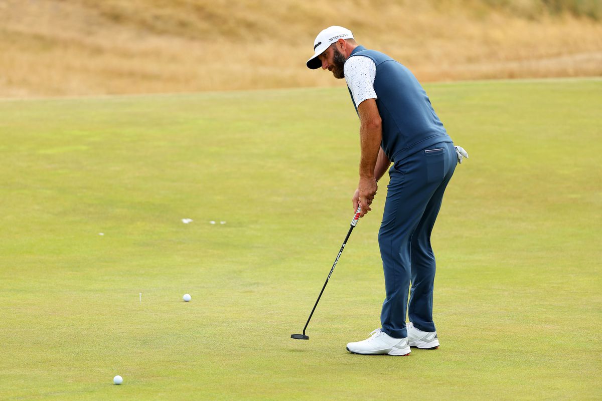 Dustin Johnson of The United States putt during a practice round prior to The 150th Open at St Andrews Old Course on July 13, 2022 in St Andrews, Scotland.