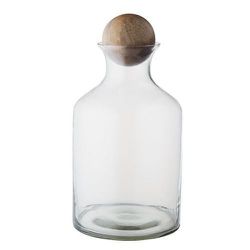 <strong>West Elm</strong> Tall Whiskey Bottle With Wood Stopper, <a href="http://www.westelm.com/products/glass-bottles-with-wood-stoppers-c434/?pkey=cbar-tools&cm_src=bar-tools||NoFacet-_-NoFacet-_--_-">$23 (reg $29)</a>