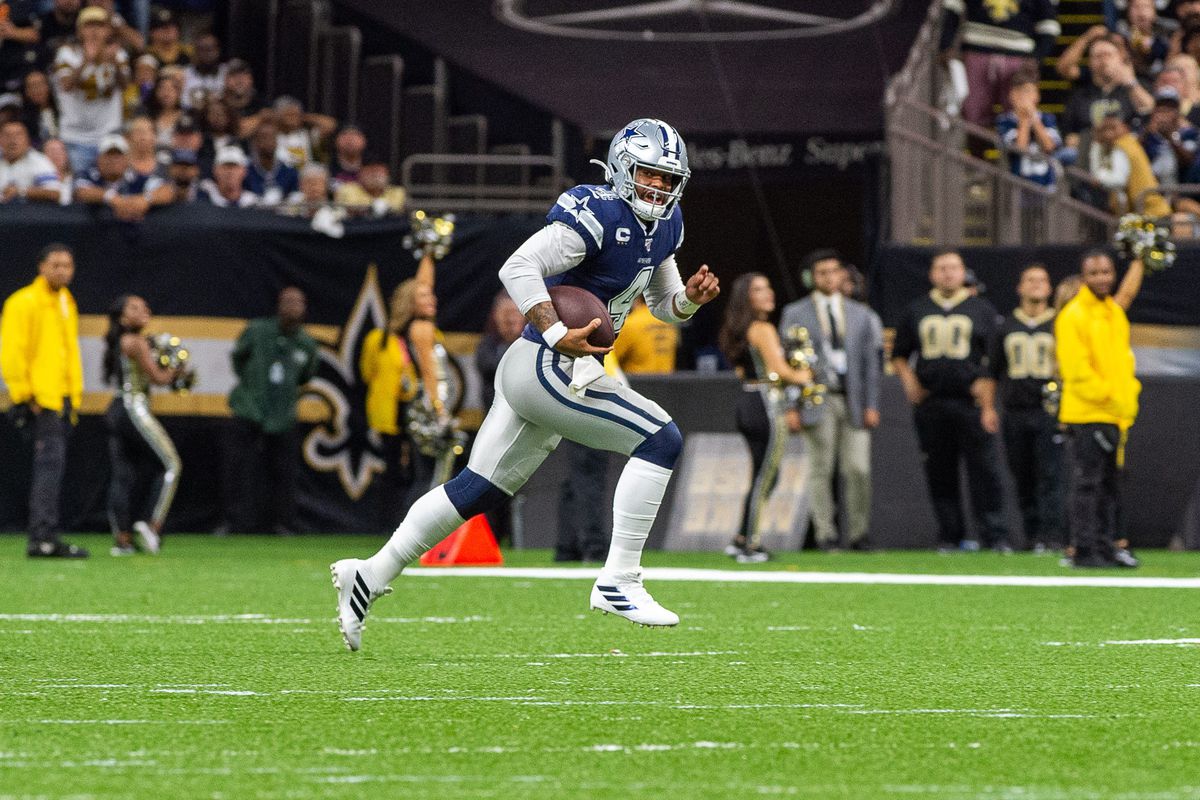 Dak Prescott runs the ball as The New Orleans Saints take on the Dallas Cowboys in the Mecedes-Benz Superdome. Sunday, Sept. 29, 2019.
