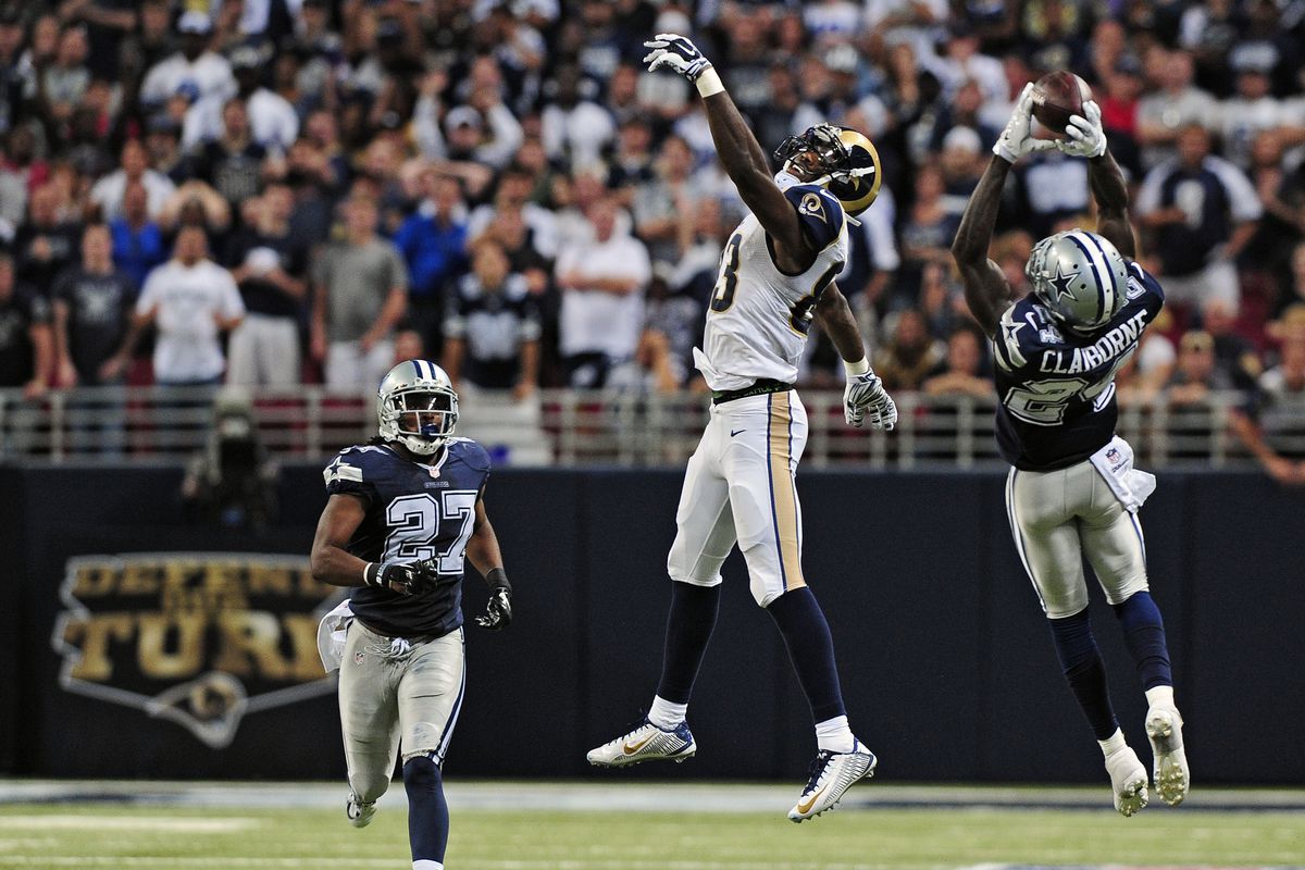 Dallas Cowboys CB Morris Claiborne intercepts a pass intended for Los Angeles Rams WR Brian Quick