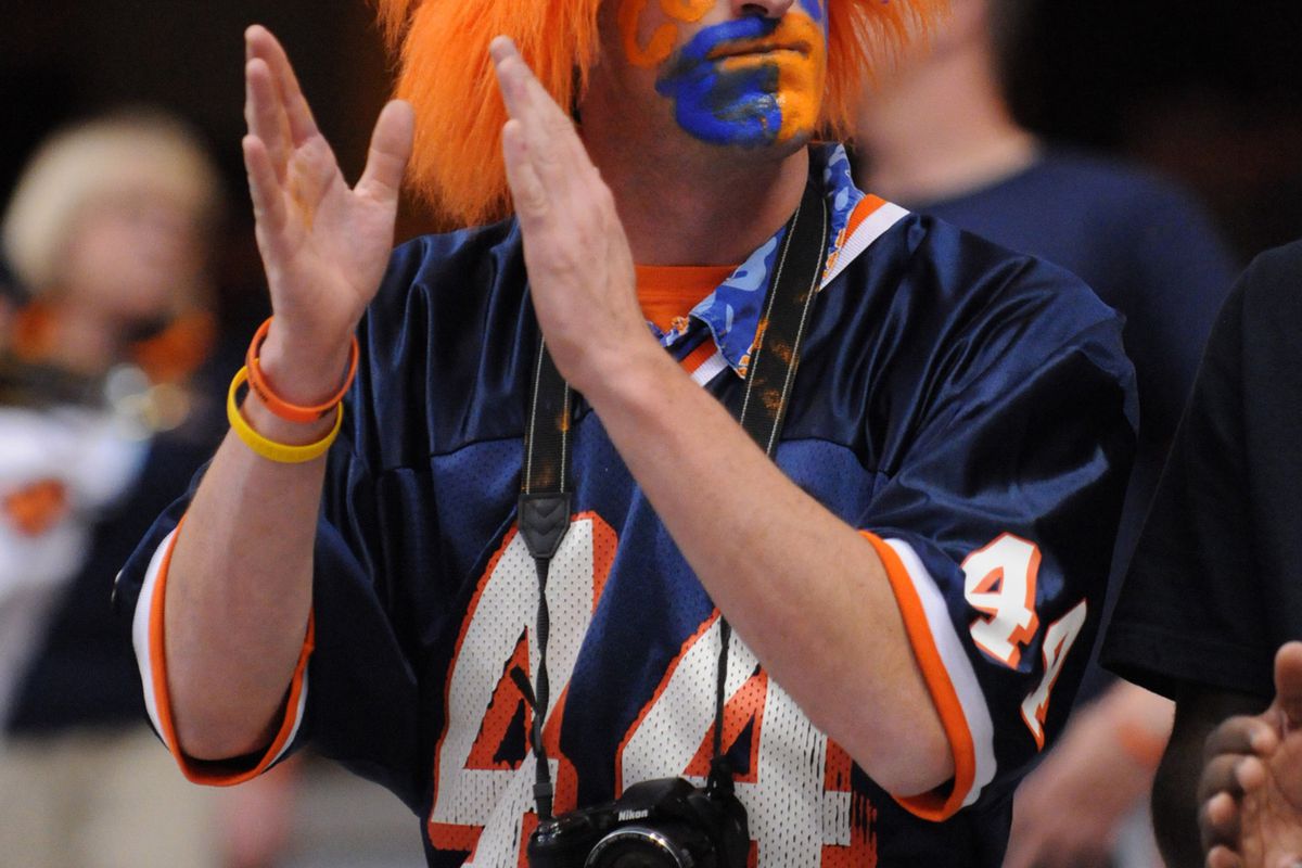 September 15, 2012; Syracuse, NY, USA; A Syracuse Orange fan watches his team during a game against the Stony Brook Seawolves at the Carrier Dome. Syracuse won the game 28-17. Mandatory Credit: Mark Konezny-US PRESSWIRE