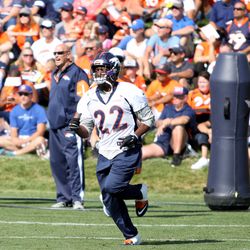Broncos RB C.J. Anderson jogs to his next drill