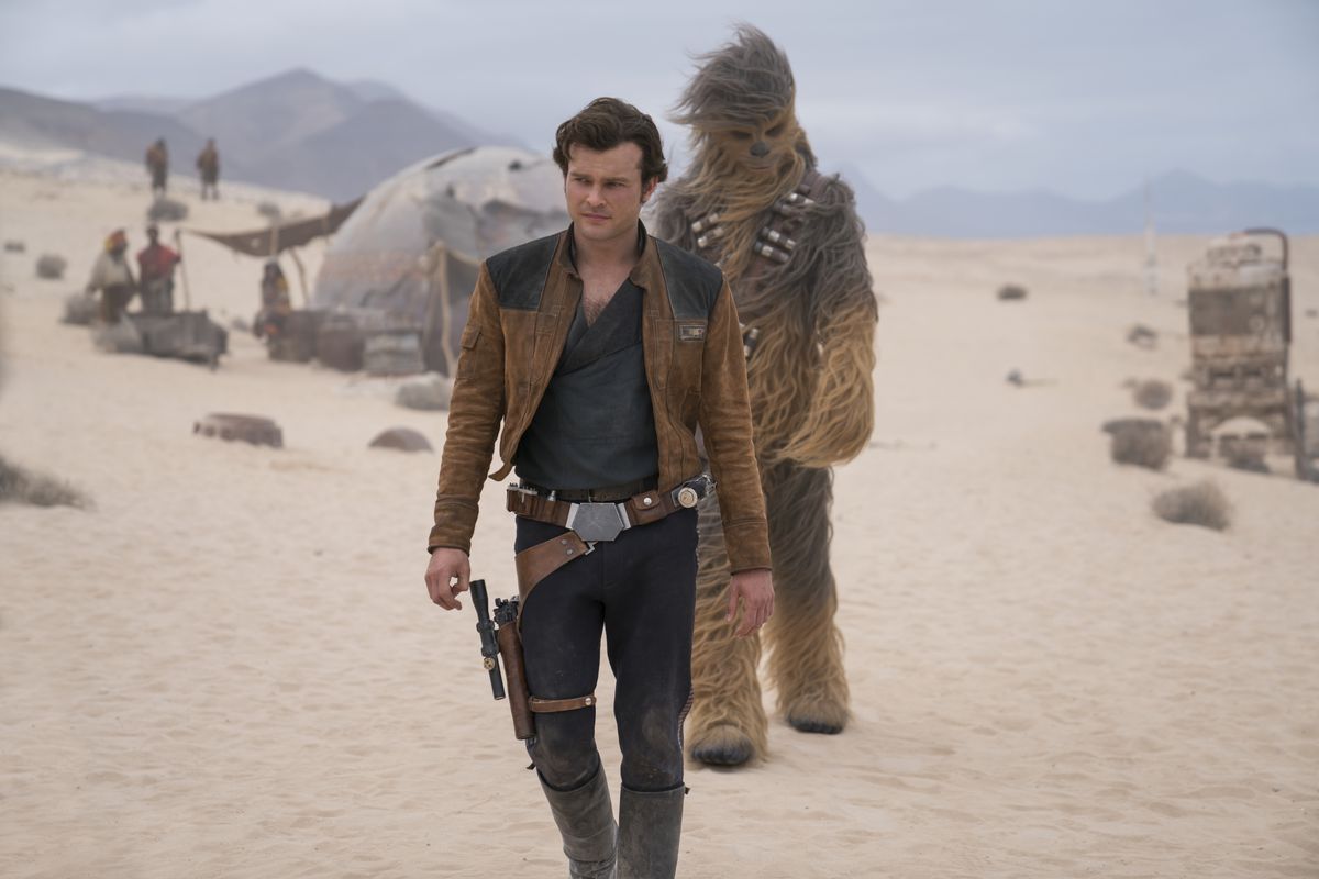 This image released by Lucasfilm shows Alden Ehrenreich and Joonas Suotamo in a scene from "Solo: A Star Wars Story." (Jonathan Olley/Lucasfilm via AP)