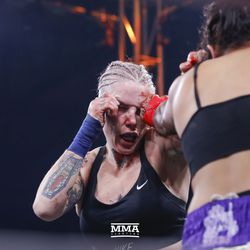 Alma Garcia lands a jab on Bec Rawlings on Saturday night at Bare Knuckle FC inside Cheyenne Ice & Events Center in Wyoming. 