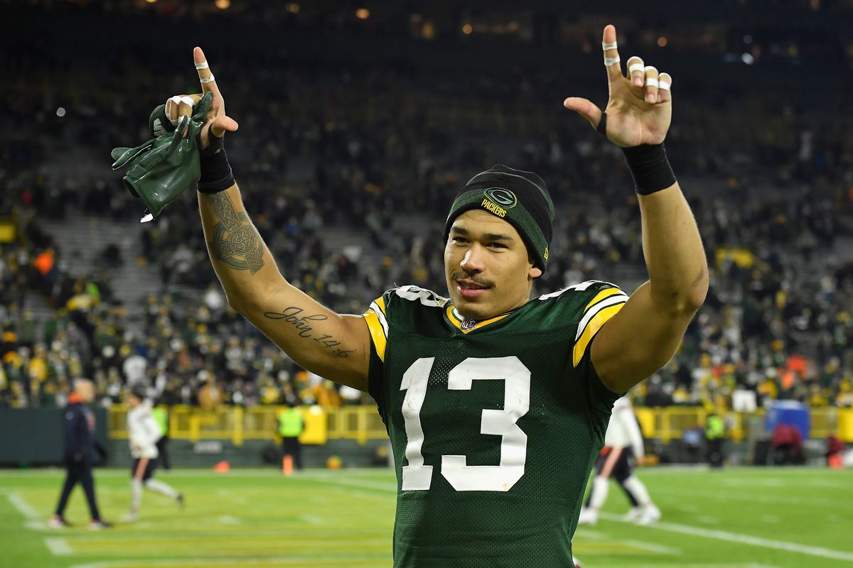 Allen Lazard #13 of the Green Bay Packers reacts on the field following the 45-30 victory over the Chicago Bears in the NFL game at Lambeau Field on December 12, 2021 in Green Bay, Wisconsin.