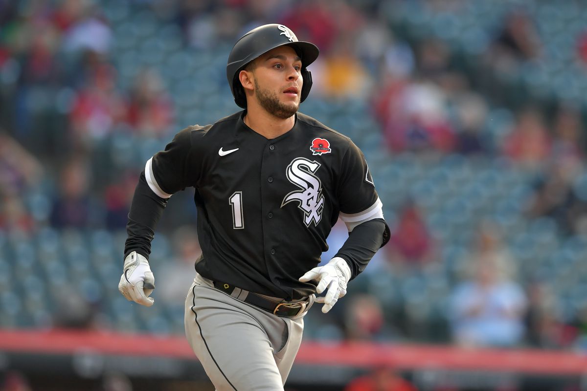 Nick Madrigal #1 of the Chicago White Sox runs out an RBI single during the third inning of game two of a doubleheader against the Cleveland Indians at Progressive Field on May 31, 2021 in Cleveland, Ohio.