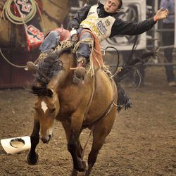 Kaycee Feild wins Saturday night's bareback competition. Feild tied for third overall in the rodeo during the final day of the Days of '47 Rodeo at Energy Solutions Arena on July 26.