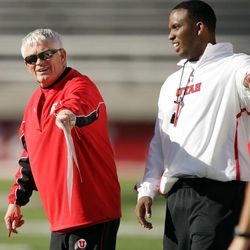 University of Utah football offensive coordinators Dennis Erickson and Brian Johnson during a team scrimmage in Salt Lake City Friday, April 5, 2013.