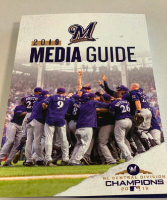 <em>The Brewers put their division-clinching celebration at Wrigley on their media guide cover. </em>