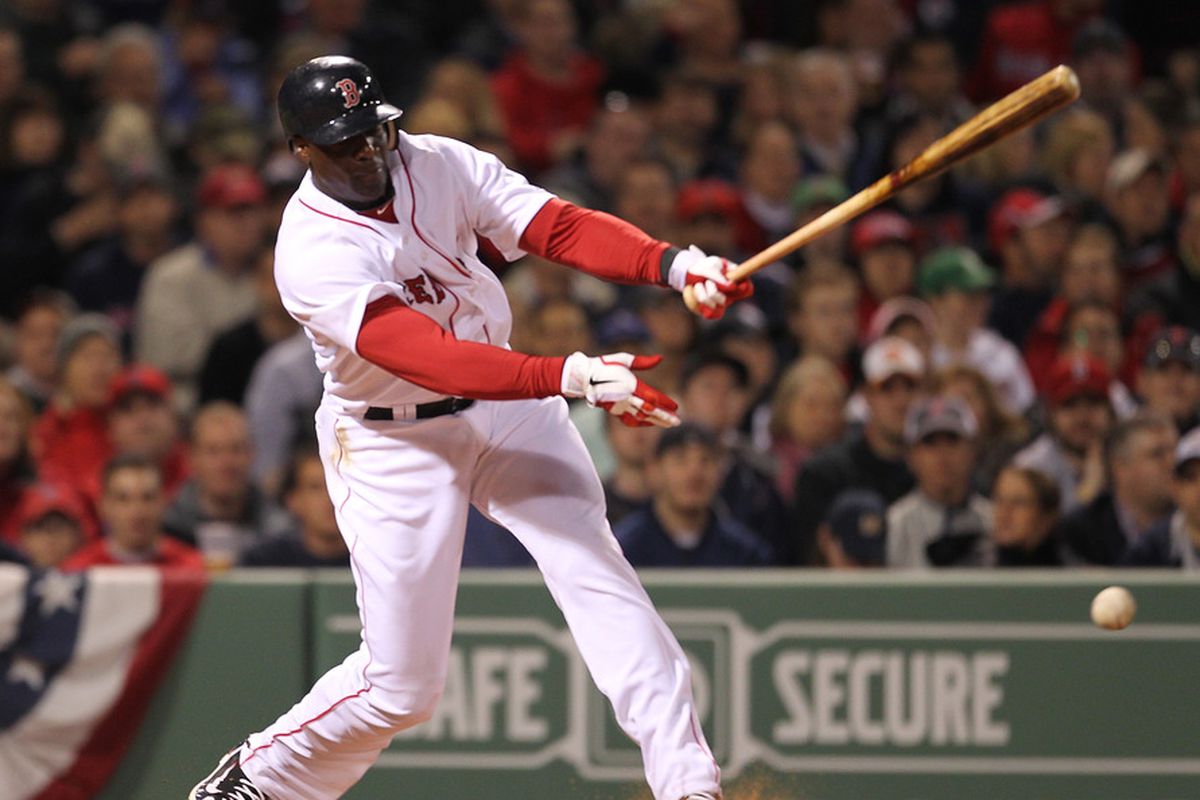 BOSTON, MA - APRIL 10: Mike Cameron #23 of the Boston Red Sox knocks in a run against the New York Yankees in the third inning at Fenway Park April 10, 2011 in Boston, Massachusetts. (Photo by Jim Rogash/Getty Images)