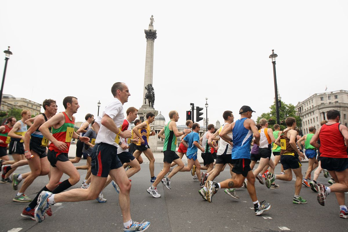 LONDON, ENGLAND - MAY 30:  50 invited club runners make their way past Nelson's Column on the LOCOG 2012 Test Event for the London 2012 Olympic Marathon at Tralgar Square on May 30, 2011 in London, England.  (Photo by Bryn Lennon/Getty Images)