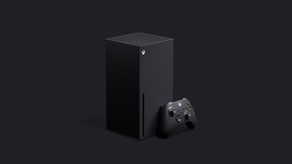 front left angle shot of Xbox Series X with controller standing in front of the console’s bottom right corner