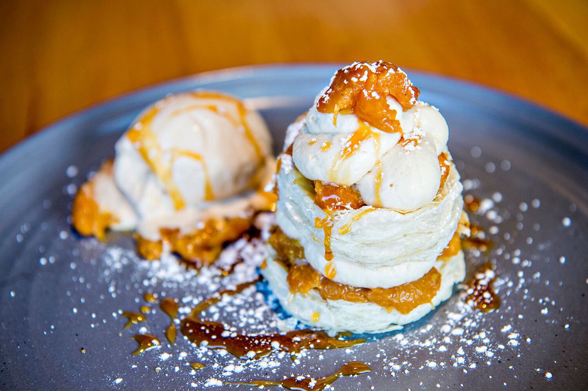 The Roasted Peach Napolean with Palisaide peaches, caramelized honey whipped cream and bourbon  butterscotch ice cream. 