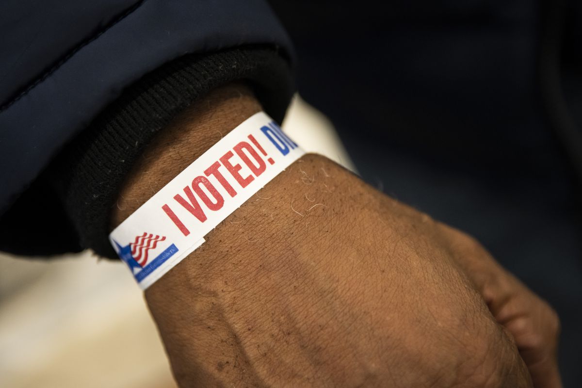 Fred Blakely, 75, of South Shore, shows off his “I voted!” bracelet after casting his ballot last week.