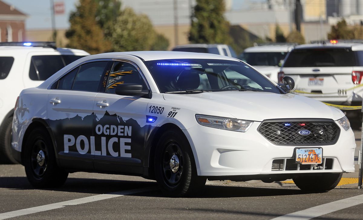 A police vehicle is parked at the scene of an officer-involved shooting at the intersection of 31st Street and Wall Avenue in Ogden on Wednesday, Sept. 30, 2020.