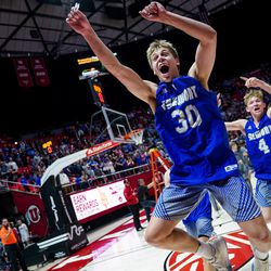Fremont’s Dallin Hall and teammates celebrate their win over Davis in the 6A boys basketball championship game at the Huntsman Center in Salt Lake City on Saturday, Feb. 29, 2020.