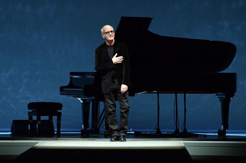 MILAN, ITALY - JANUARY 13: Ludovico Einaudi performs at the Canali show as a part of Milan Fashion Week Menswear Autumn/Winter 2014 on January 13, 2014 in Milan, Italy. (Photo by Tullio M. Puglia/Getty Images)