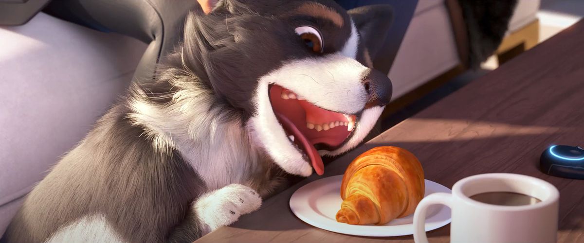 Murphy, Sojourn’s dog, attempts to eat a croissant in a still from the Overwatch 2 animated short “Calling.”