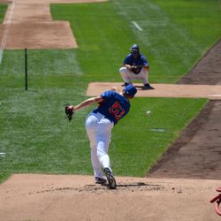 11:48 a.m. Pitcher Ben Rowen throwing in the Cubs bullpen - 