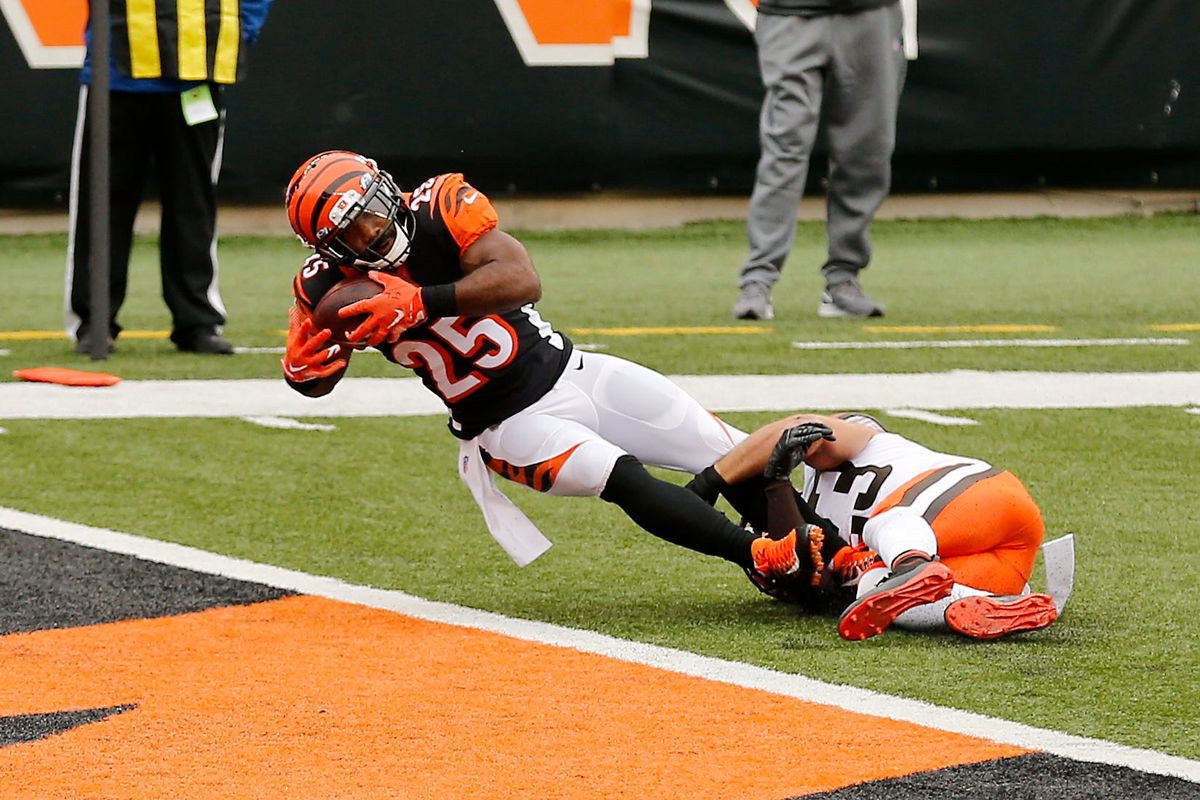 Cincinnati Bengals running back Giovani Bernard (25) stretches into the end zone after a catch for a go-ahead touchdown in the fourth quarter of the NFL Week 7 game between the Cincinnati Bengals and the Cleveland Browns at Paul Brown Stadium in downtown Cincinnati on Sunday, Oct. 25, 2020.&nbsp;