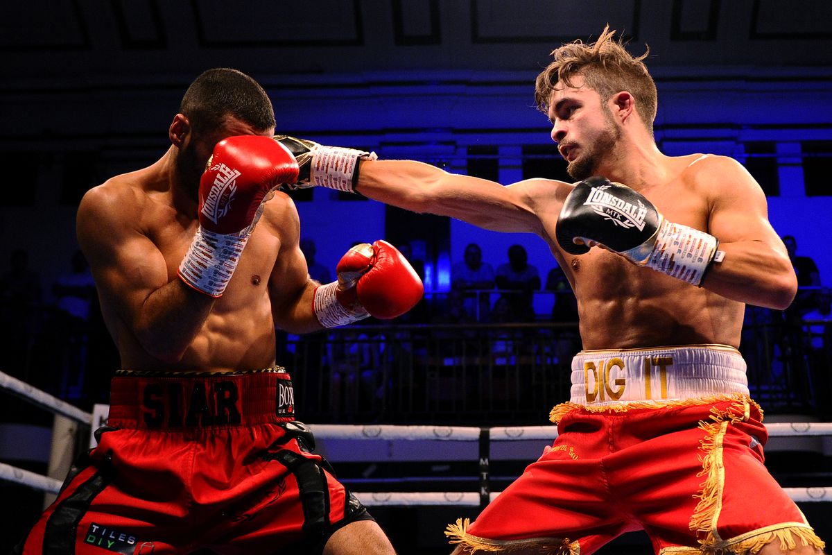 Anthony Yigit punches Siar Ozgul during the Super-Lightweight fight between Siar Ozgul and Anthony Yigit at York Hall on June 28, 2019 in London, England.