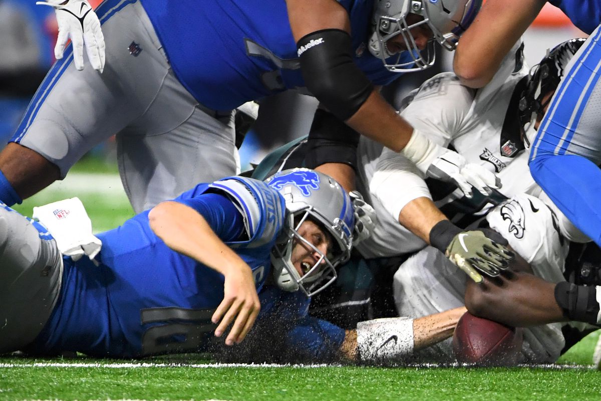 Jared Goff #16 of the Detroit Lions recovers a fumble during the third quarter against the Philadelphia Eagles at Ford Field on October 31, 2021 in Detroit, Michigan.