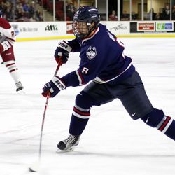 UConn's Spencer Naas (8) during the UConn Huskies vs UMass Minutemen men's college hockey game at the Mullins Center in Amherst, MA on December 1, 2017.