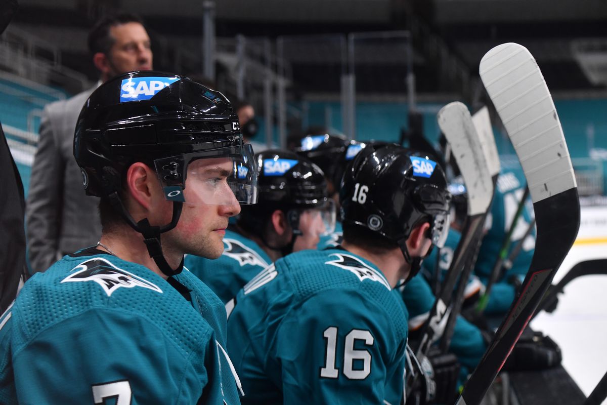 Dylan Gambrell #7 of the San Jose Sharks watches from the bench while facing the Anaheim Ducks at SAP Center on April 6, 2021 in San Jose, California.