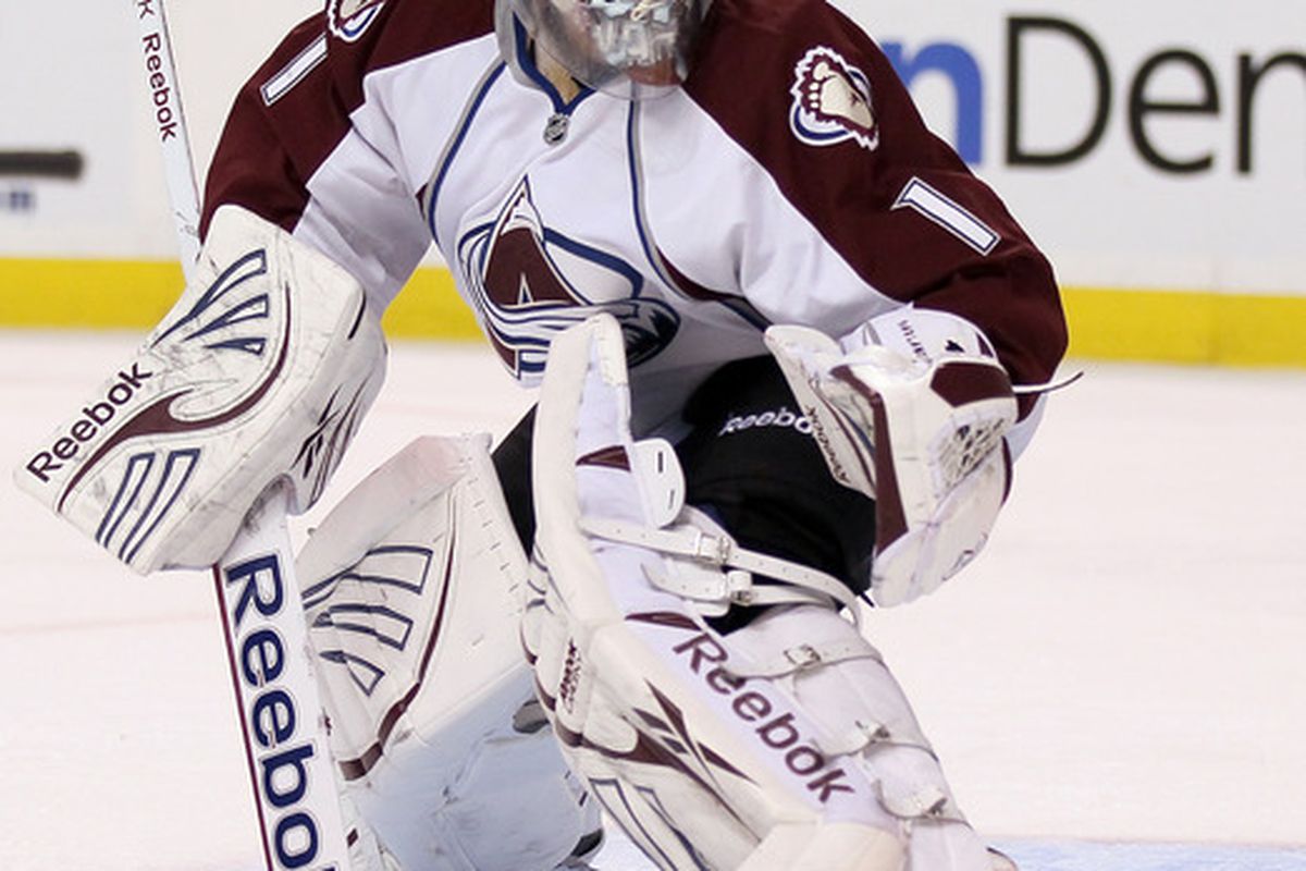 BOSTON, MA - OCTOBER 10:  Semyon Varlamov #1 of the Colorado Avalanche clears the puck against the Boston Bruins on October 10, 2011 at TD Garden in Boston, Massachusetts.  (Photo by Elsa/Getty Images)