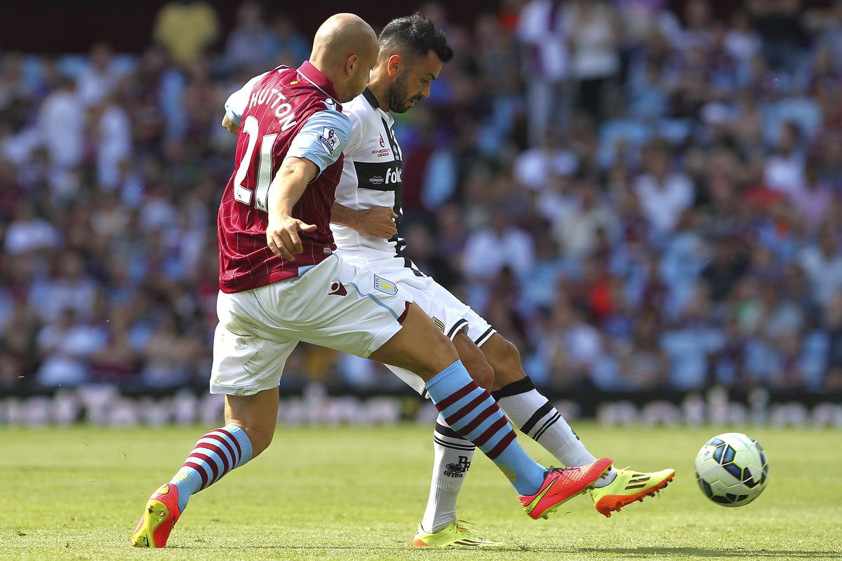 Alan Hutton makes a challenge during the 0-0 draw with Parma on Saturday.