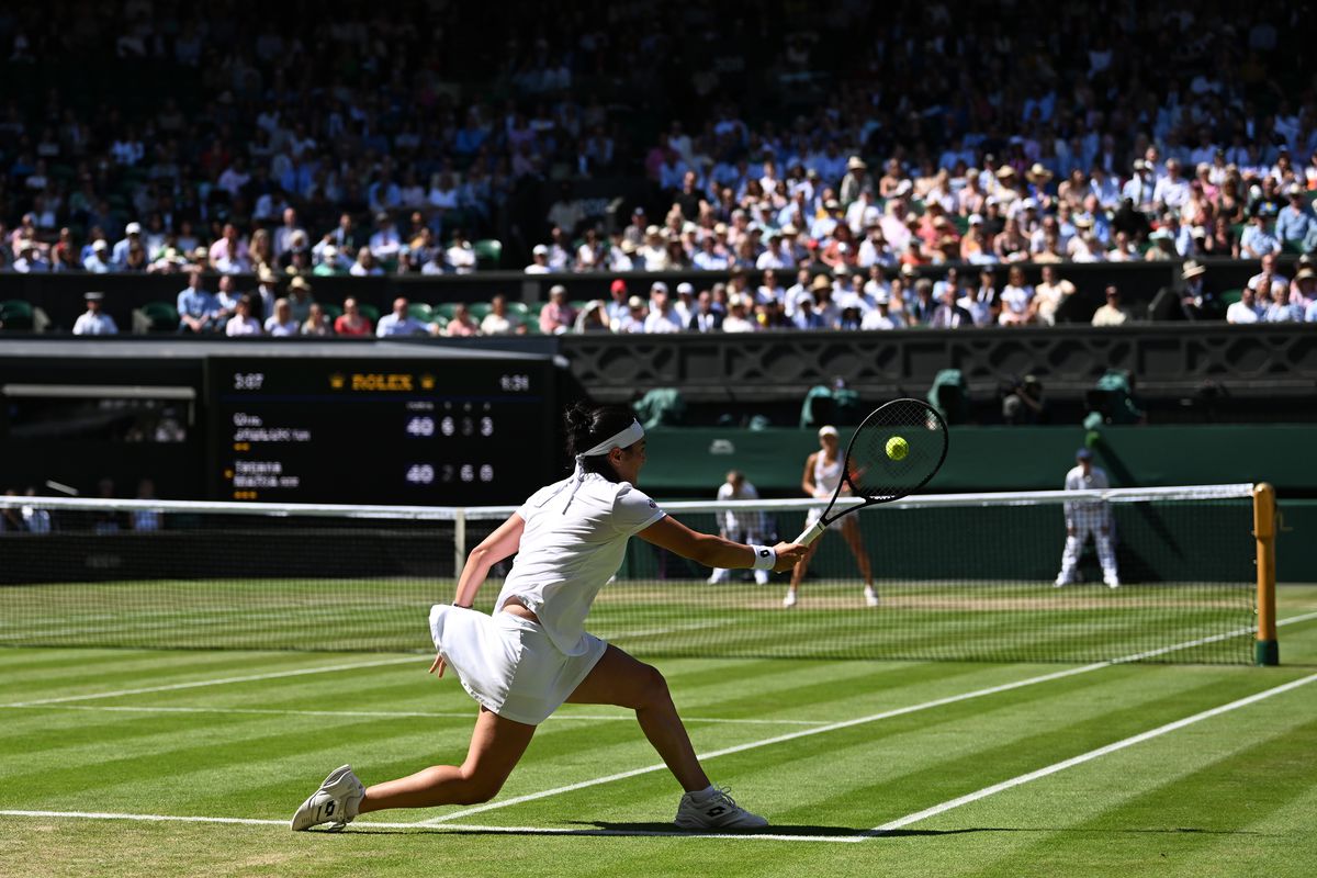 Ons Jabeur of Tunisia plays a forehand against Tatjana Maria of Germany during their Women’s Singles Semi-Final match on day eleven of The Championships Wimbledon 2022 at All England Lawn Tennis and Croquet Club on July 07, 2022 in London, England.