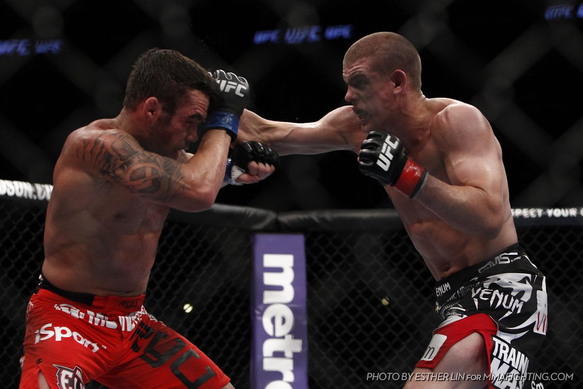 Jamie Varner (left) fights Joe Lauzon (right) last night during the UFC on Fox 4 main card. Photo by Esther Lin via MMA Fighting